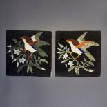 A PAIR OF PIETRA DURA BLACK MARBLE COASTERS Inlaid with coloured stones providing a bird and