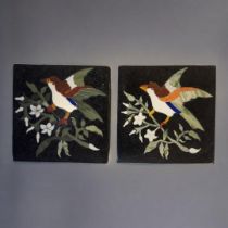 A PAIR OF PIETRA DURA BLACK MARBLE COASTERS Inlaid with coloured stones providing a bird and