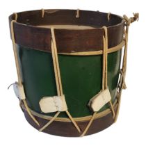 AN EARLY 20TH CENTURY MILITARY TYPE SNARE DRUM With a leather top and green painted border. (h