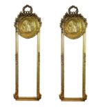 A PAIR OF 19TH CENTURY STYLE HALL MIRRORS The circular floral crest centred with a Grecian scene,