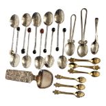 A SET OF TEN HALLMARKED SILVER TEASPOONS Twisted handle with semi precious stone finials, London,