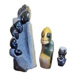 A COLLECTION OF VINTAGE AFRICAN STONE CARVINGS Portrait group with textured finish and two single