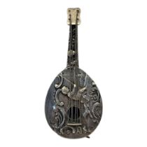 A 19TH CENTURY CONTINENTAL SILVER NOVELTY MANDOLIN Having an embossed design of a child fishing. (