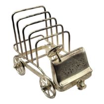 A SILVER PLATED GOLF CART TOAST RACK With working wheel mechanism. (10cm x 16cm x 12cm) Condition: