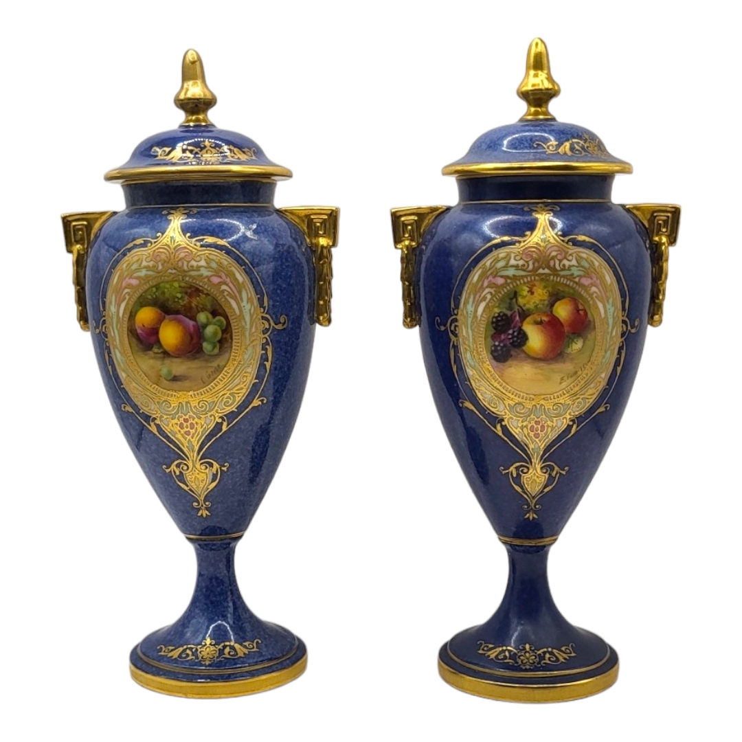 ROYAL WORCESTER, A PAIR OF BONE CHINA LIDDED CABINET VASES AND COVERS, CIRCA 1930 Coloured enamels