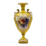 R. SEBRIGHT FOR ROYAL WORCESTER, PORCELAIN OVIFORM TWIN HANDLED VASE Painted with fruit, puce