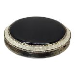 AN EARLY 20TH CENTURY SILVER AND GUILLOCHÉ ENAMEL POWDER COMPACT White enamel border with black