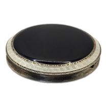 AN EARLY 20TH CENTURY SILVER AND GUILLOCHÉ ENAMEL POWDER COMPACT White enamel border with black
