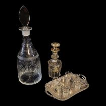 AN EARLY 19TH CENTURY SWEDISH GLASS MALLET SHAPED DECANTER AND FLATTENED LOZENGE STOPPER, CIRCA 1800