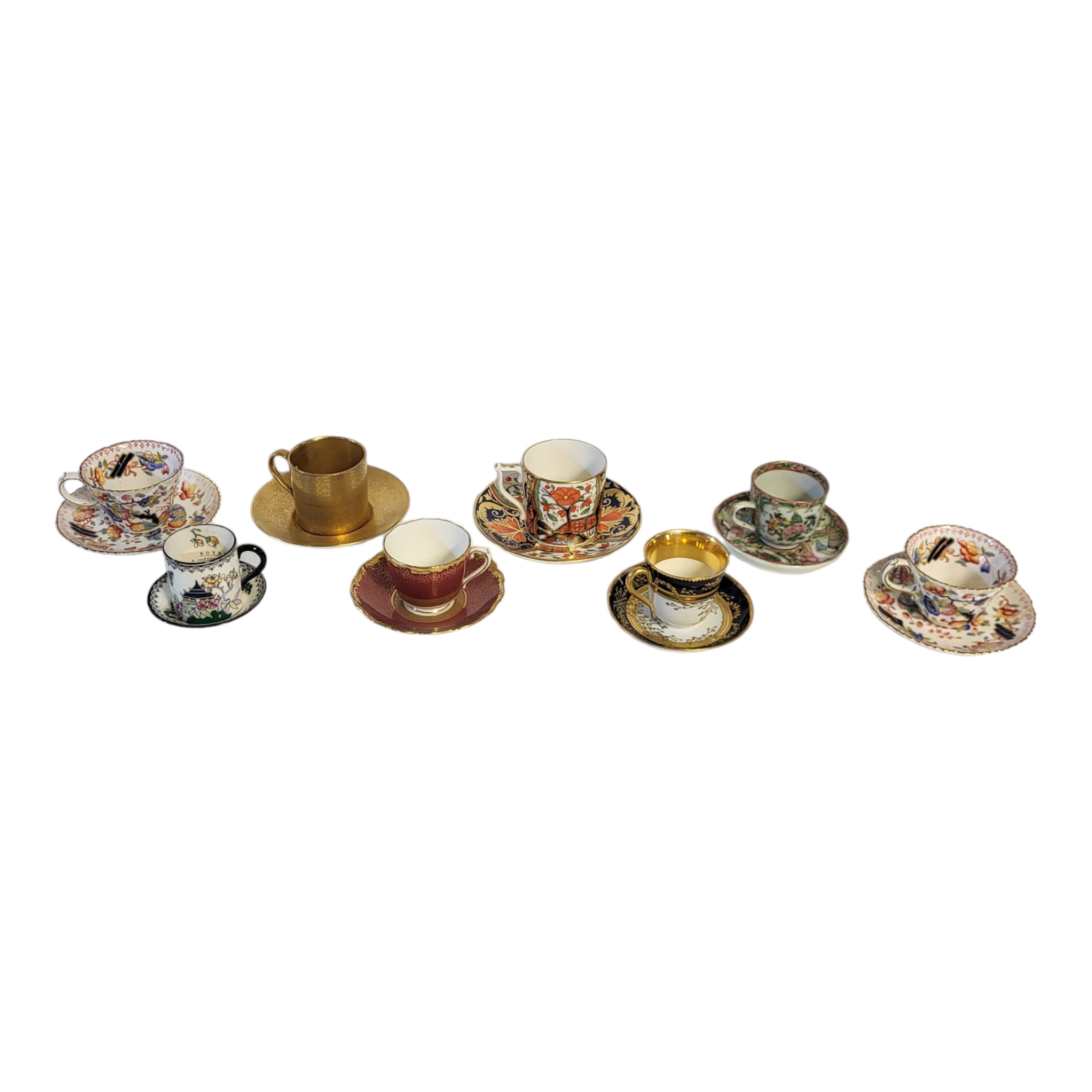 A COLLECTION OF VICTORIAN AND LATER PORCELAIN CABINET COFFEE CANS AND SAUCERS Comprising a Royal