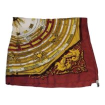 HERMES, A VINTAGE SILK 'CARRE DIES ET HORE' SCARF Signs of the zodiac within a claret border. (