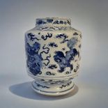 A 19TH CENTURY CHINESE BLUE AND WHITE PORCELAIN BASE Hand painted decoration of temple dogs at play,