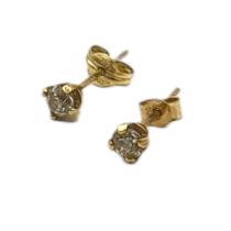 A PAIR OF 9CT GOLD AND DIAMOND SOLITAIRE STUD EARRINGS Each set a round cut diamond. (each stone
