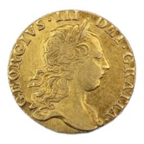 A KING GEORGE III 22CT GOLD FULL GUINEA COIN, DATED 1772 With portrait bust, bearing garnished crown