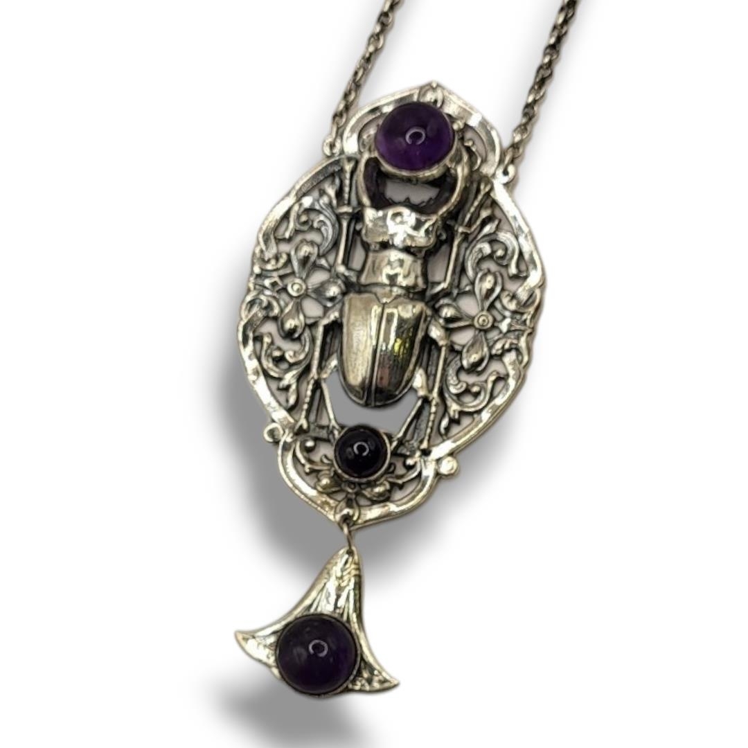 AN ART NOUVEAU STYLE STERLING SILVER SCARAB BEETLE NECKLACE Set with cabochon cut amethyst stones in - Image 2 of 2
