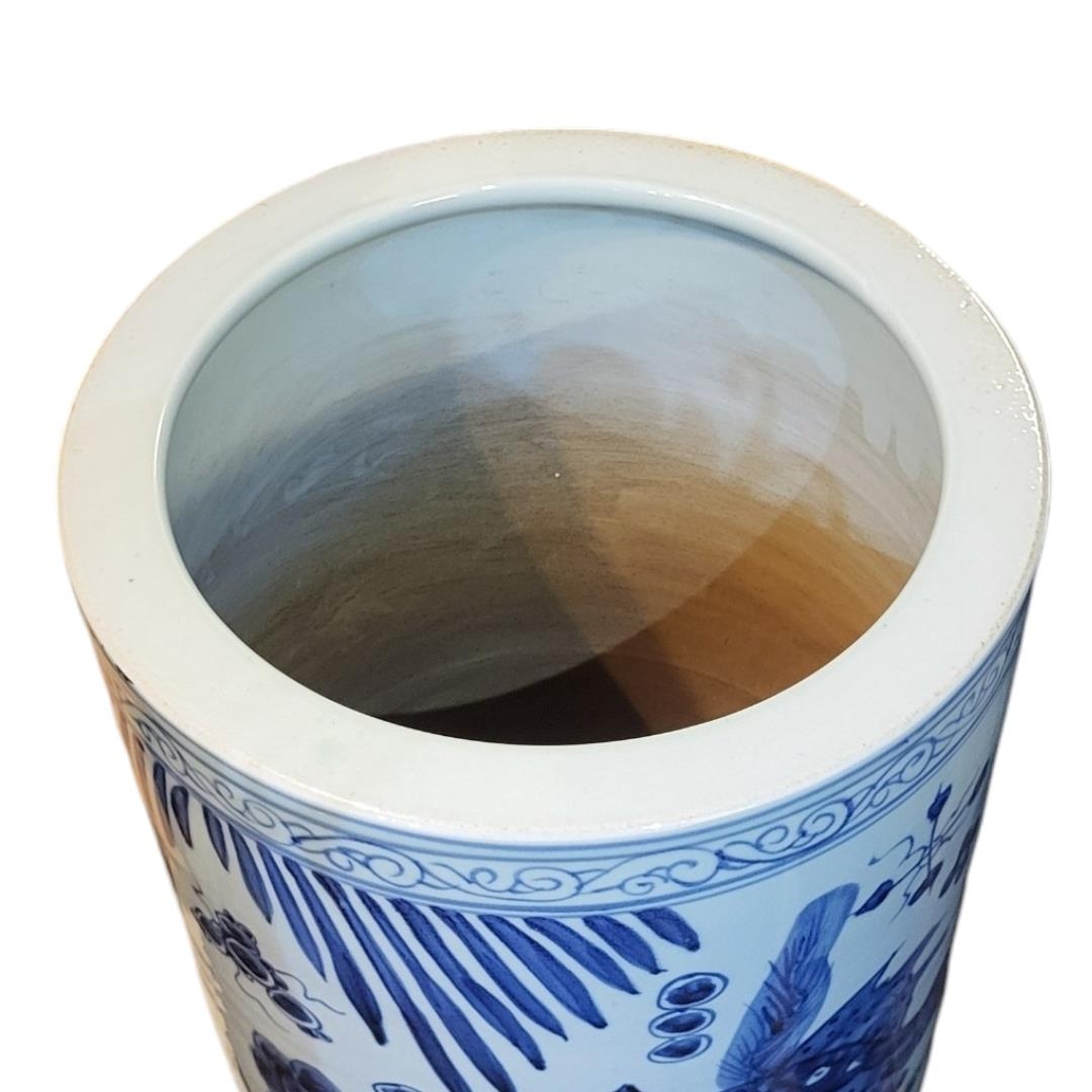 A TALL CHINESE BLUE AND WHITE CERAMIC CYLINDRICAL UMBRELLA STAND Decorated with aquatic life and - Image 2 of 2