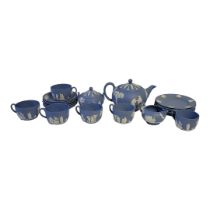 WEDGWOOD, A VINTAGE PALE BLUE AND WHITE JASPERWARE,TEA SERVICE Comprising a teapot, sugar basin,