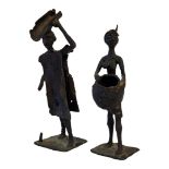 A PAIR OF CAST BRONZE NATIVE TRIBAL NOMADIC FIGURES OF FARMERS (POSSIBLY CENTRAL AFRICAN). (