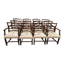 A LONG SET OF TWELVE EARLY 20TH CENTURY GEORGIAN STYLE MAHOGANY OPEN ARM DINING CHAIRS With