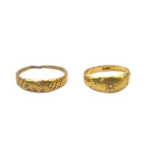 TWO EARLY 20TH CENTURY 18CT GOLD AND DIAMOND RINGS In rubover setting. Condition: good
