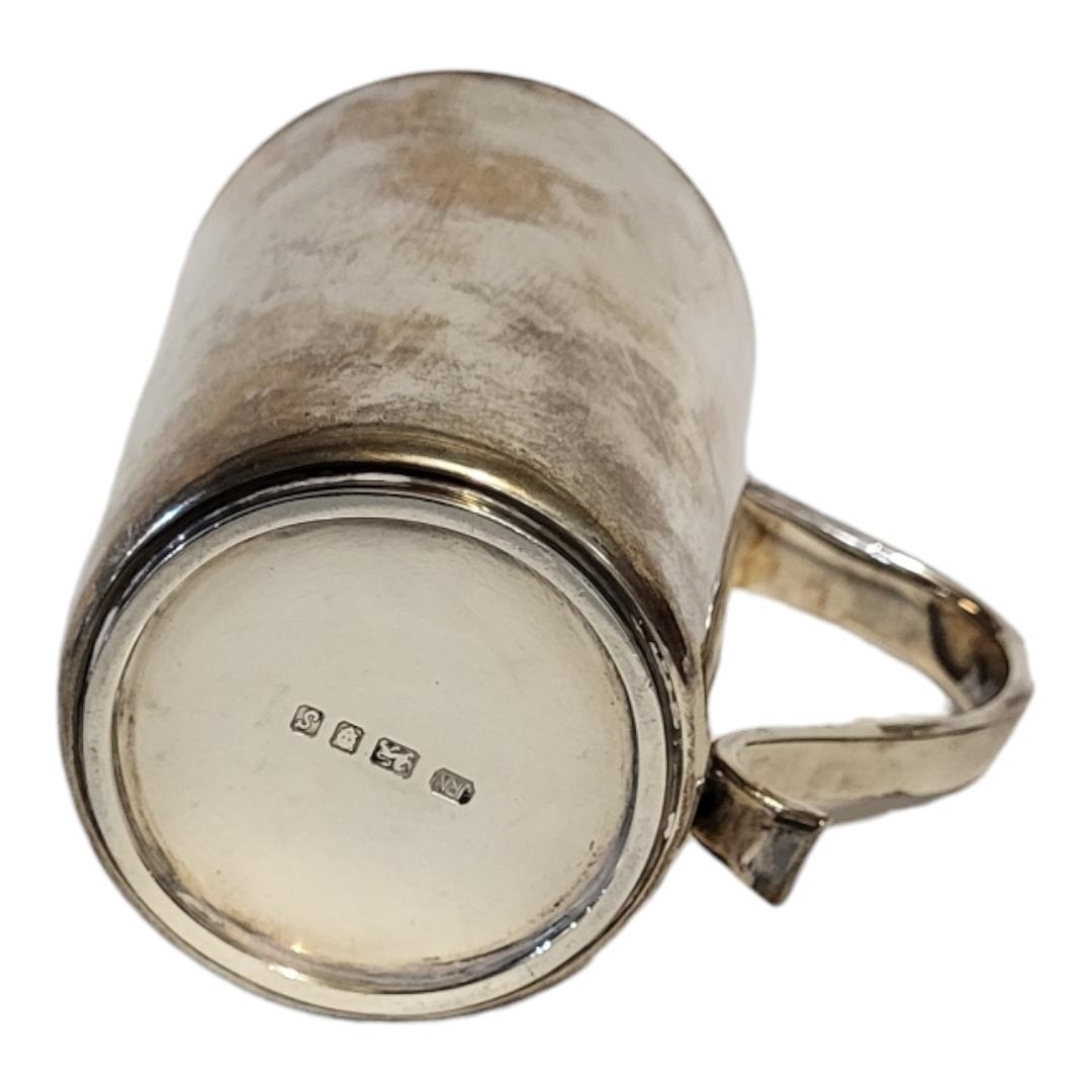 A SOLID SILVER TANKARD OF PLAIN DESIGN With hollow handle, London, 1973, by J.R.N., engraved to - Image 5 of 5