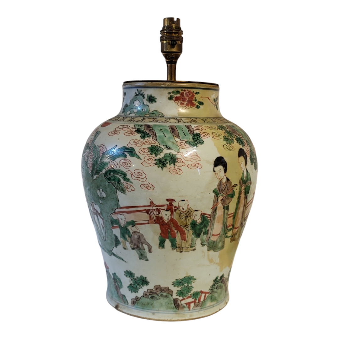 AN 18TH CENTURY CHINESE FAMILLE ROSE HARD PASTE PORCELAIN BALUSTER LAMP BASE Enamelled in polychrome