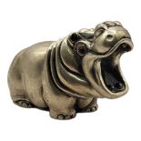 AFTER FABERGÉ, A SILVER PLATED HIPPO PAPER WEIGHT With ruby glass eyes, stamped with Russian