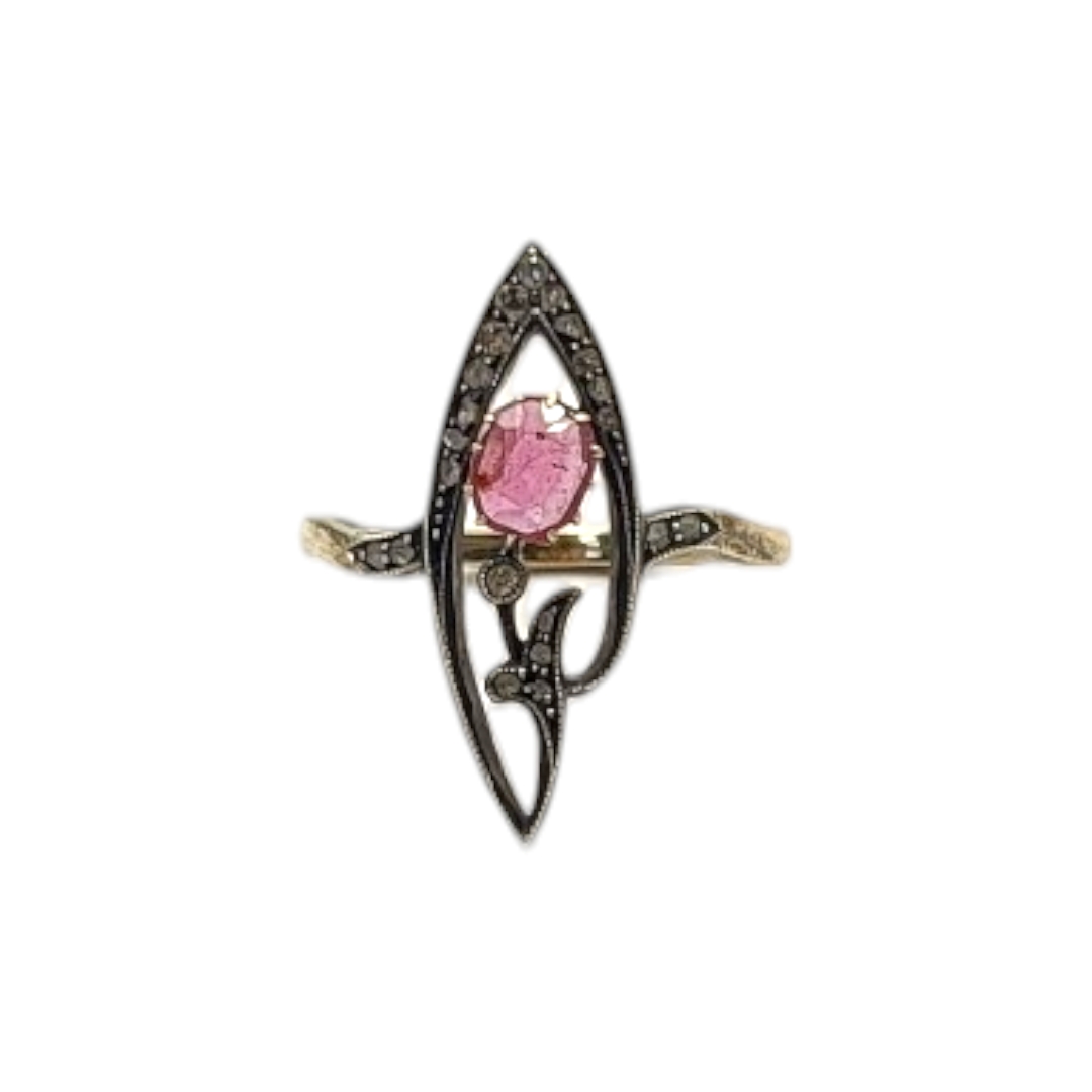 AN EARLY 20TH CENTURY 14CT GOLD, RUBY AND DIAMOND RING Set with an oval cut ruby edged with diamonds