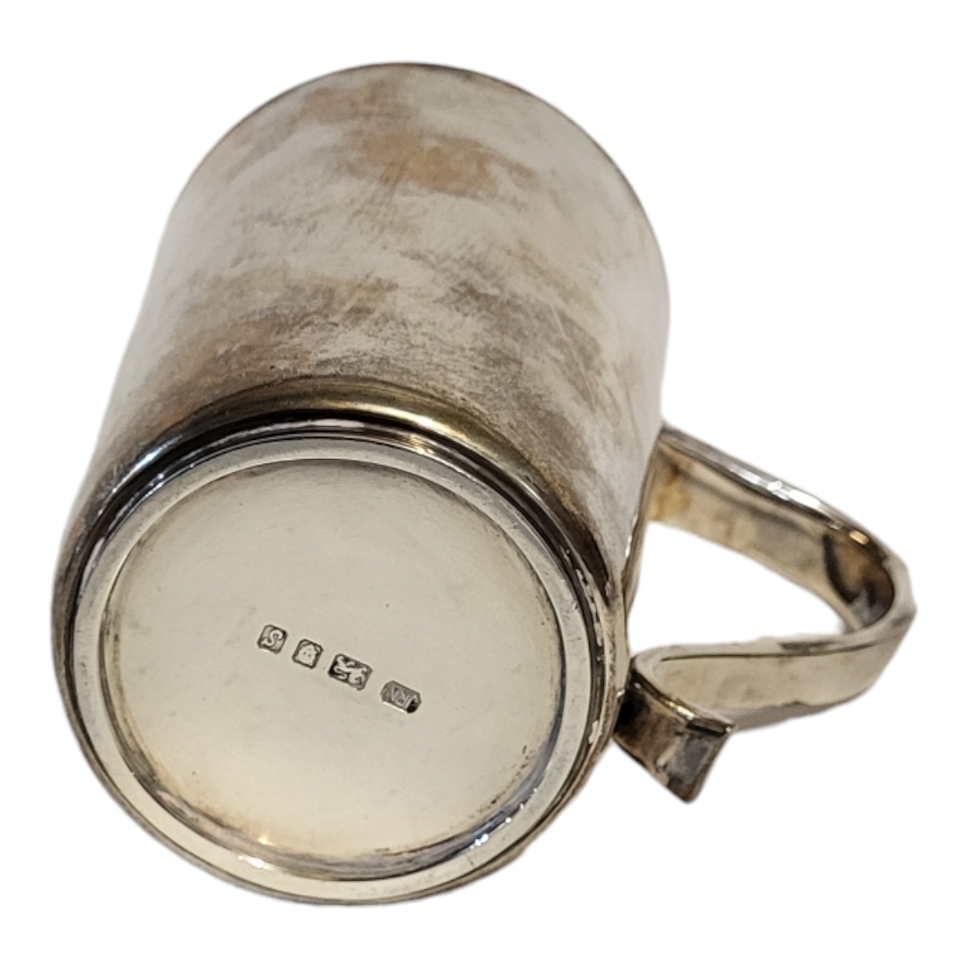 A SOLID SILVER TANKARD OF PLAIN DESIGN With hollow handle, London, 1973, by J.R.N., engraved to - Image 4 of 5