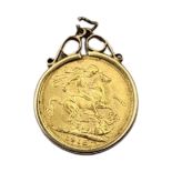 AN EARLY 20TH CENTURY 22CT GOLD FULL SOVEREIGN COIN, DATED 1918 With King George and George and