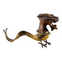 A 20TH CENTURY GERMAN/AUSTRIAN RAMS HORN AND CARVED WOOD INKWELL IN THE FORM OF A GROTESQUE CREATURE
