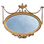 MANNER OF ROBERT ADAM, A LATE 19TH/EARLY 20TH CENTURY NEOCLASSICAL DESIGN OVAL GILTWOOD AND GESSO