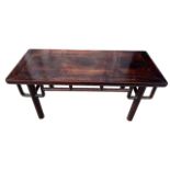 A RARE 17TH CENTURY CHINESE ZITAN LOW TABLE The single panelled top set within a rectangular frame