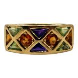 A 14CT GOLD, AMETHYST, CITRINE AND PERIDOT RING Having two triangular cabochon cut amethysts (