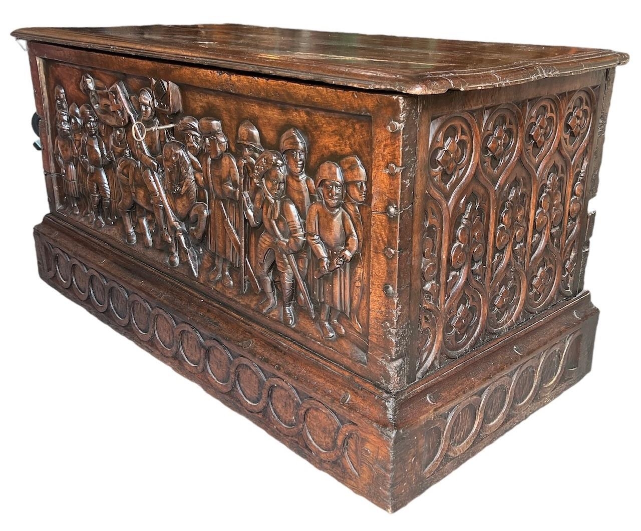 A RARE 15TH CENTURY FRENCH CARVED WALNUT COFFER,With hinge lid above carved panel in relief with a - Image 3 of 4