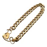 A 9CT GOLD FLAT CURB LINK BRACELET/CHARM BRACELET Having heart shaped padlock clasp. (approx