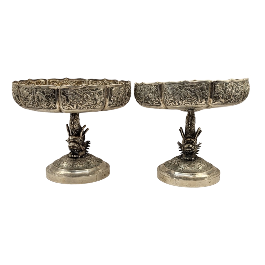 HUNG CHONG, CANTON AND SHANGHAI, A PAIR OF DECORATIVE CHINESE SILVER TAZZAS, CIRCA 1900 Each tazza