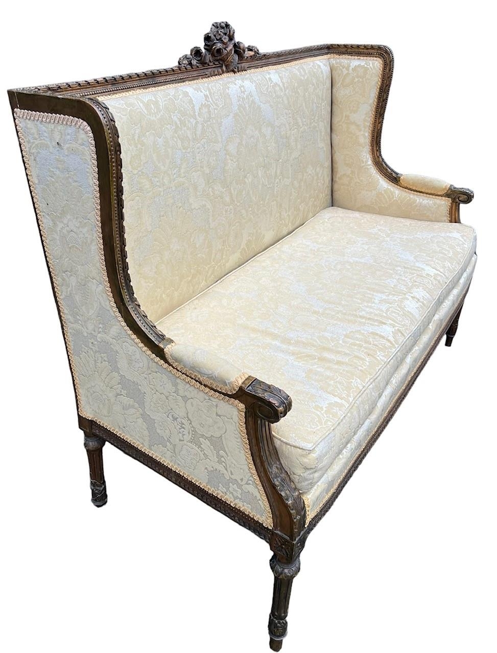 A 19TH CENTURY FRENCH LOUIS XVI DESIGN CARVED GILTWOOD WINGBACK SETTEE The back carved with a - Image 2 of 5