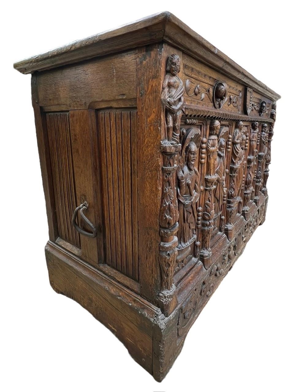 A 16TH CENTURY FRENCH, OAK COFFER with hinged lid above carved freeze decorated with swags and - Image 9 of 13