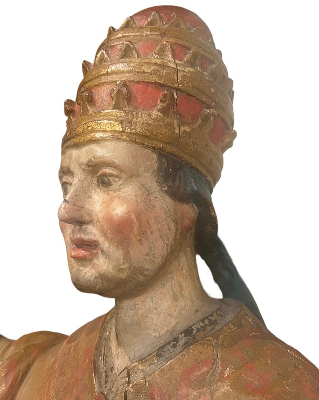 A LARGE 16TH/17TH CENTURY CARVED WOOD POLYCHROME AND GILDED STATUE OF A POPEWearing the triple - Image 8 of 9