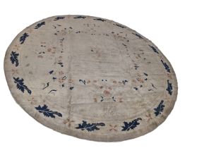 WITHDRAWN UNTIL THE 28TH OF MAY A ROUND CHINESE CIRCA 1920, WOOL PILE, COTTON FOUNDATION CARPET/RUG.