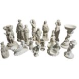 A COLLECTION OF SIXTEEN 19TH AND EARLY 20TH CENTURY PARIAN WARE FIGURES, GLAZED AND UNGLAZED, TO