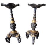 A PAIR OF CHINESE GILT BRONZE TABLE PRICKET STANDS The columns decorated with Lotus Leaf above three