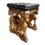 A 19TH CENTURY ITALIAN CARVED GILTWOOD AND PAINTED STOOL The solid cousin from seat with floral