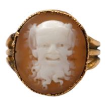 A 19TH CENTURY YELLOW METAL, CARVED CAMEO RING DEPICTING A BEARDED MAN WITH ANIMAL EARS, POSSIBLY