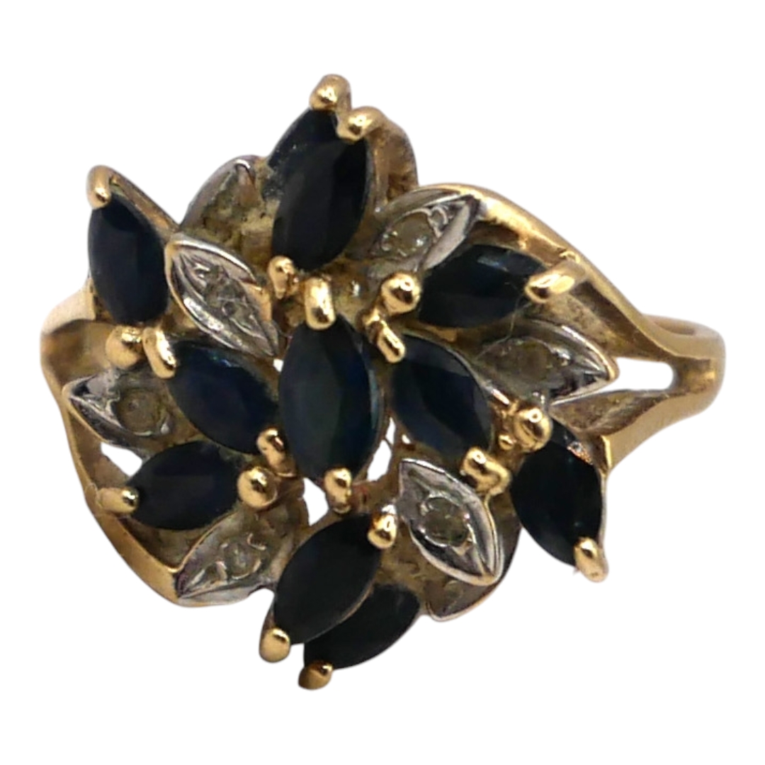 A 9CT GOLD, DIAMOND AND TOPAZ CLUSTER RING Having eleven marquise cut blue topazes (largest - Image 3 of 3