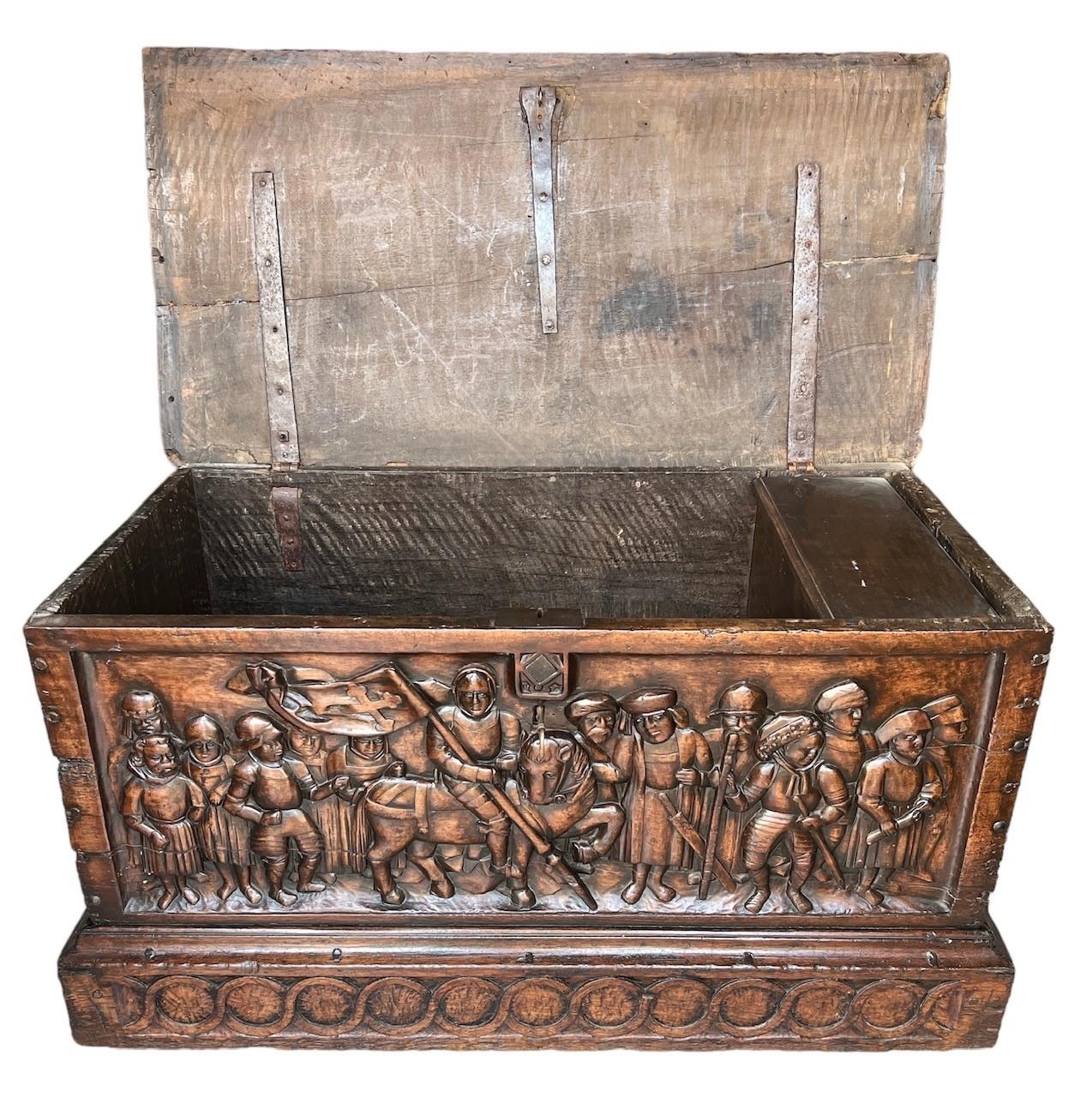 A RARE 15TH CENTURY FRENCH CARVED WALNUT COFFER,With hinge lid above carved panel in relief with a - Image 4 of 4