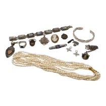 A COLLECTION OF VICTORIAN, EDWARDIAN AND LATER SILVER JEWELLERY ITEMS Comprising a Victorian 1892