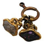 TWO VICTORIAN YELLOW METAL, AMETHYST AND AGATE FOB SEALS, YELLOW METAL TESTED AS 18CT YELLOW GOLD