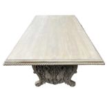 A LARGE DECORATIVE LIME OAK CARVED REFECTORY TABLE The large plank top support on carved and pierc